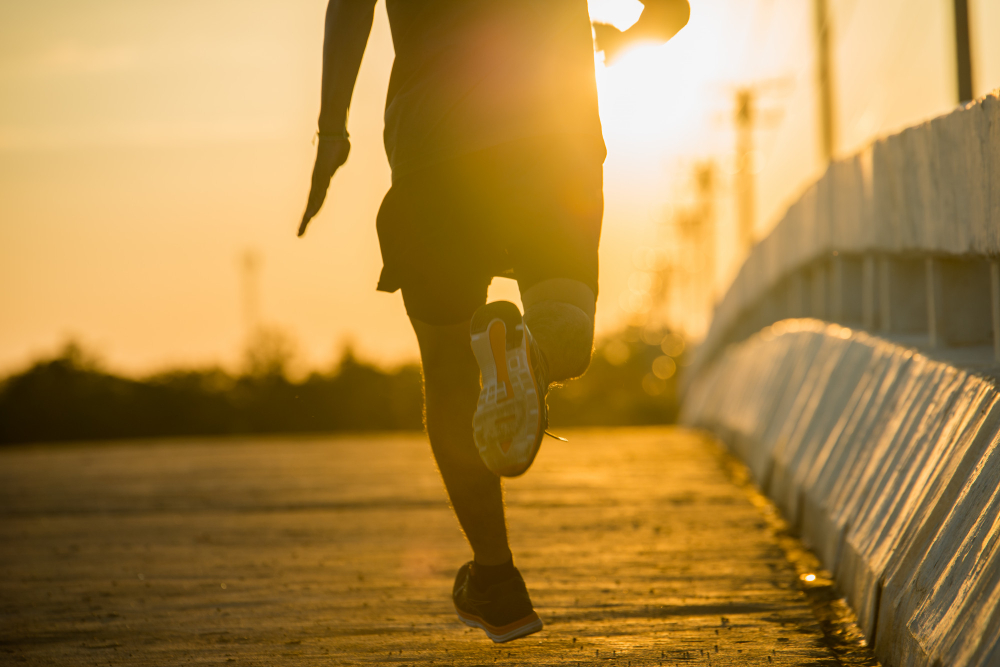 silhouette-young-fitness-man-running-sunrise-2022-09-12.jpg